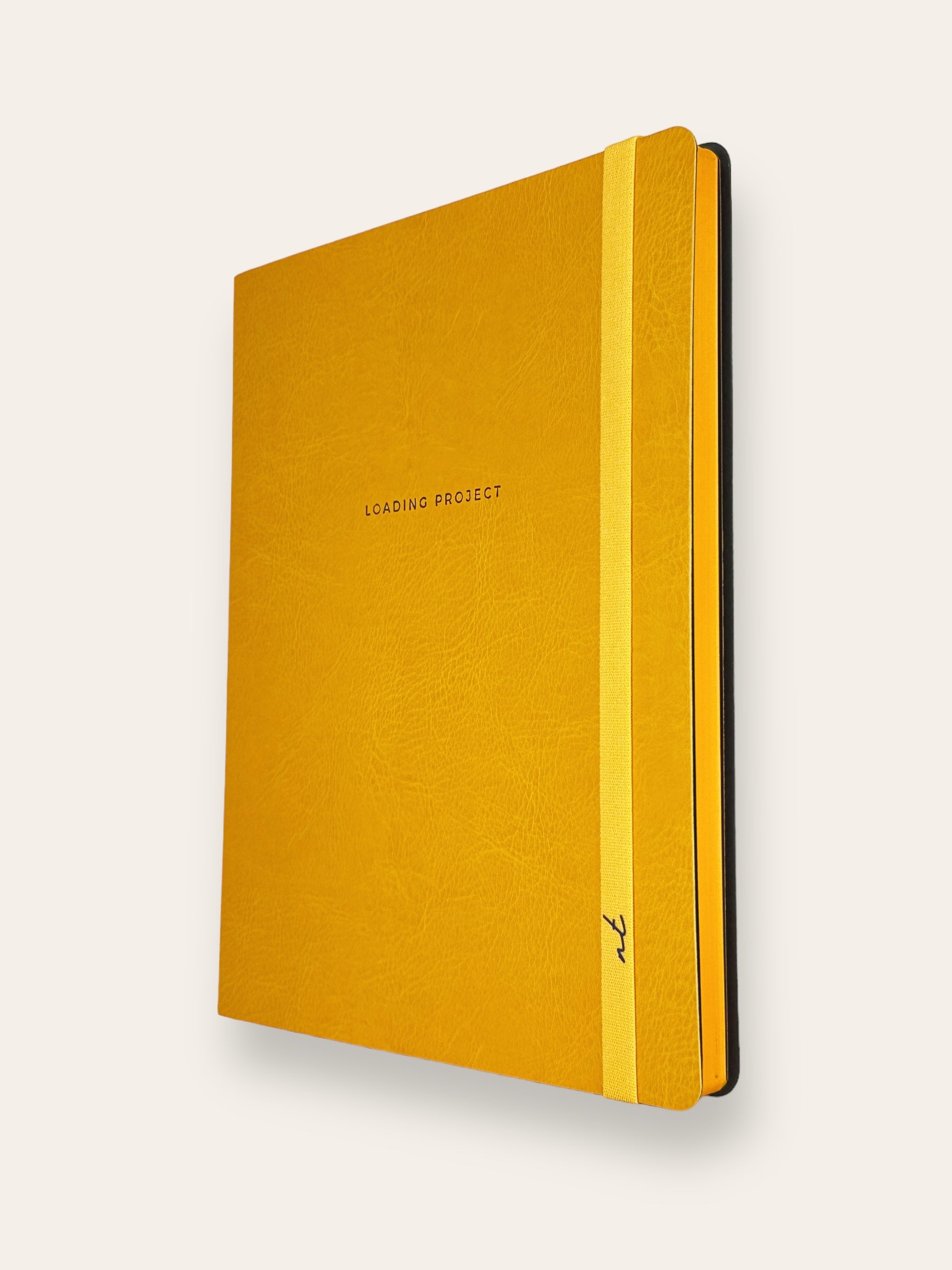 XL LOADING PROJECT SOFTCOVER NOTEBOOK